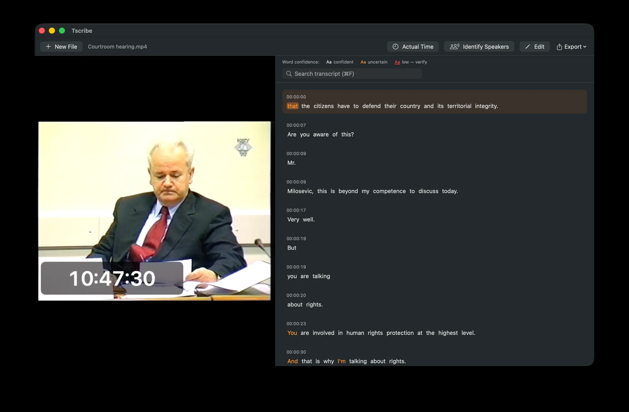 A Tscribe transcript with per-word timestamps and words color-coded by confidence